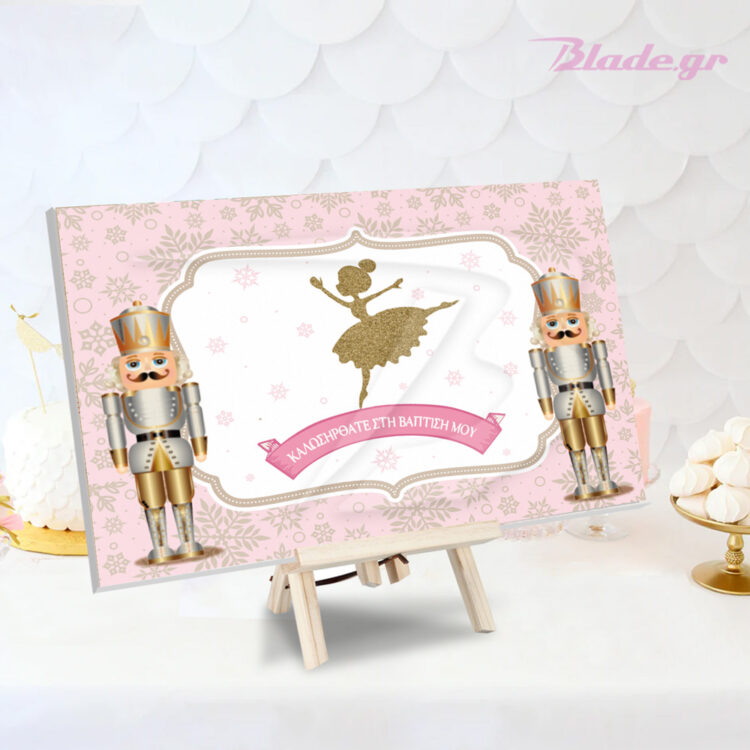 Χρυσή μπαλαρίνα - ΚΑρυοθραύστες πίνακας καβαλέτου με ροζ φόντο και το όνομα του παιδιού, για τον στολισμό του candy bar σε χριστουγεννιάτικη βάπτιση κοριτσιού